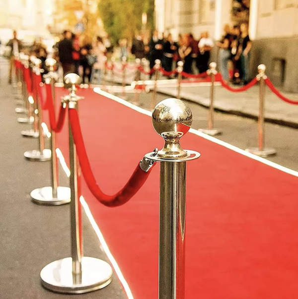 red carpet and red rope bollard